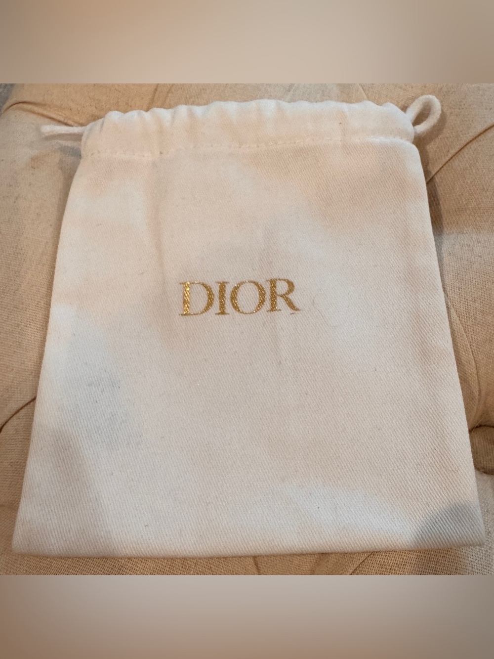 Dior Cream Drawstring Pouch with Gold Embossed Logo